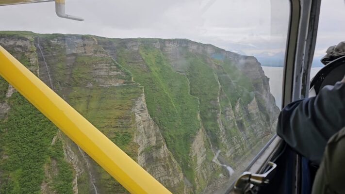 Aubrey Flying Along the Cliffs
